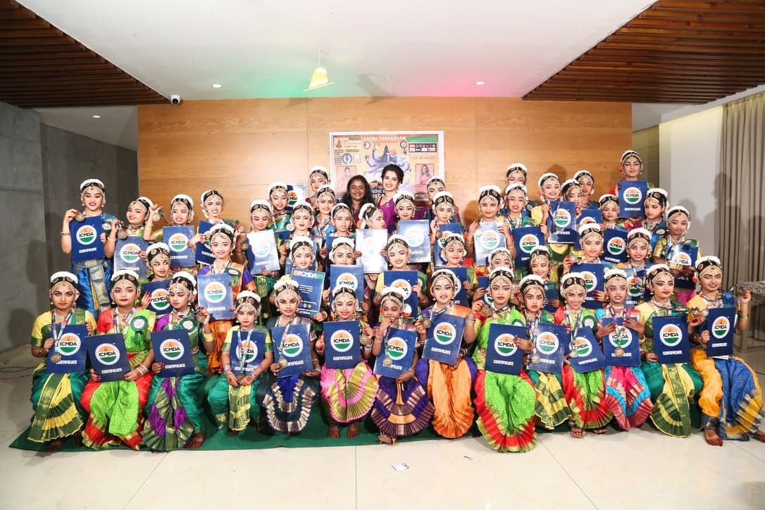 Graceful Bharatanatyam pose in traditional costume and jewelry